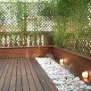 terraza en barcelona madera tropical jardineras y tarima